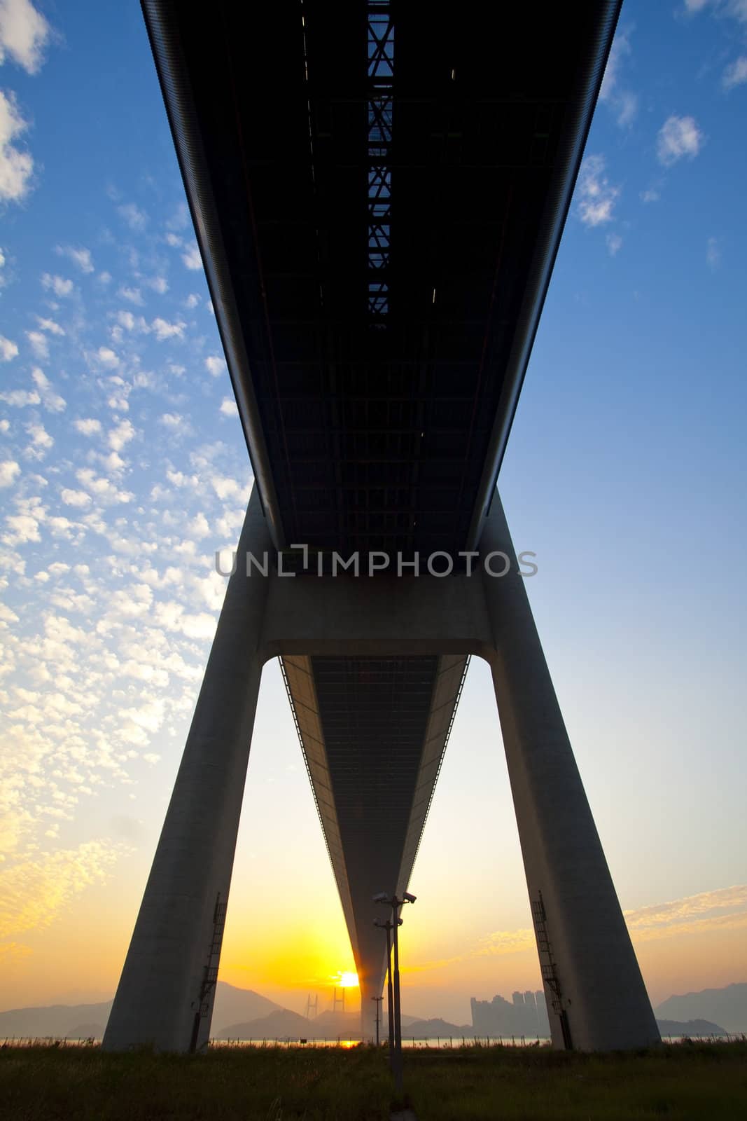 Tsing Ma Bridge landmark in Hong Kong under sunset