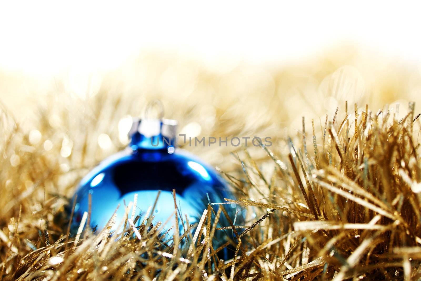  blue christmas ball on golden background