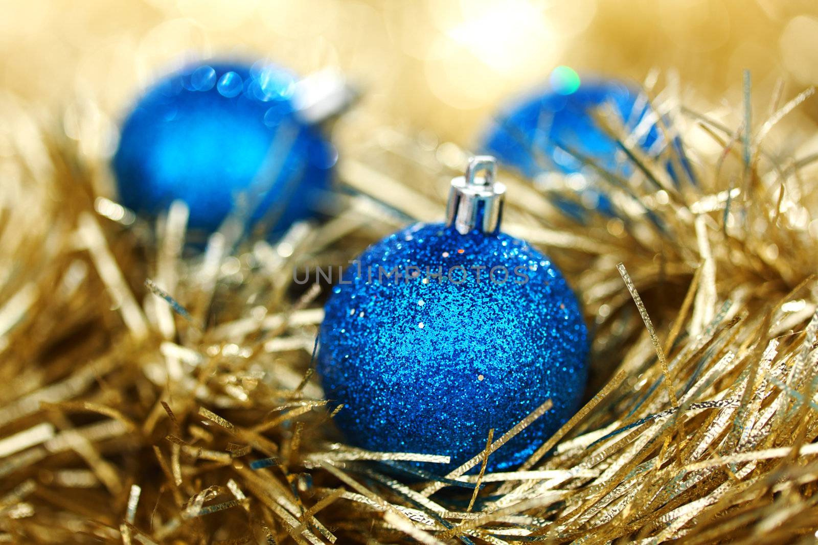  blue christmas ball on golden background