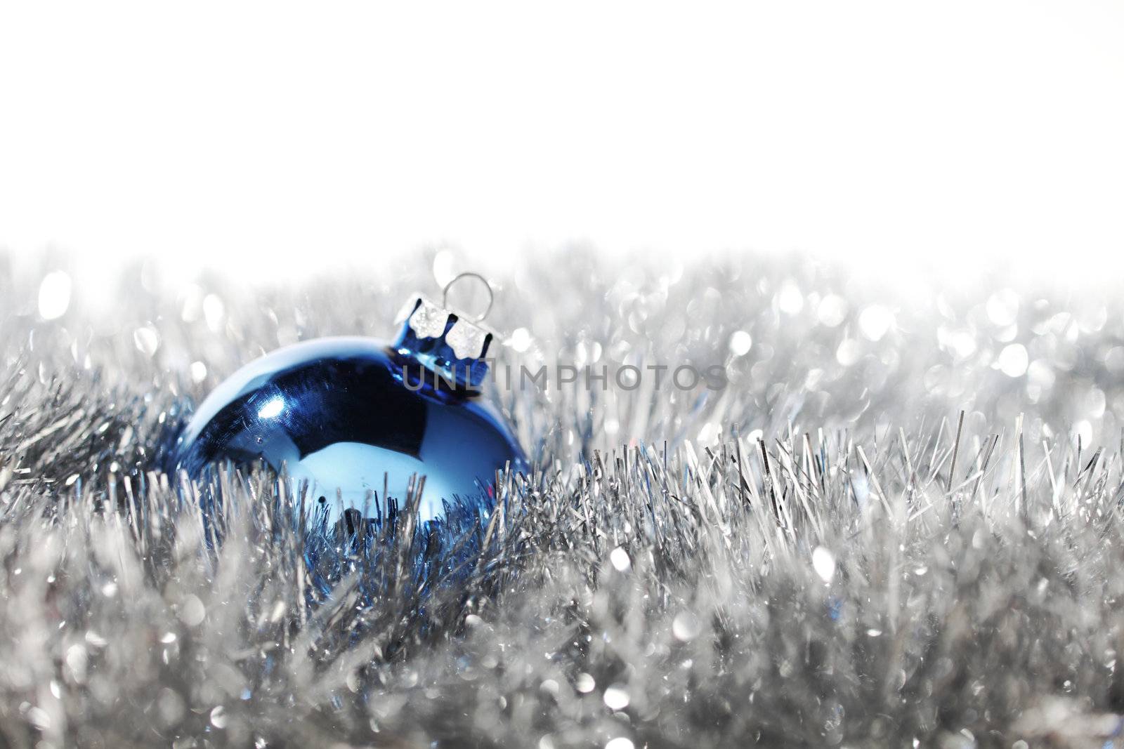 blue christmas ball on silver background