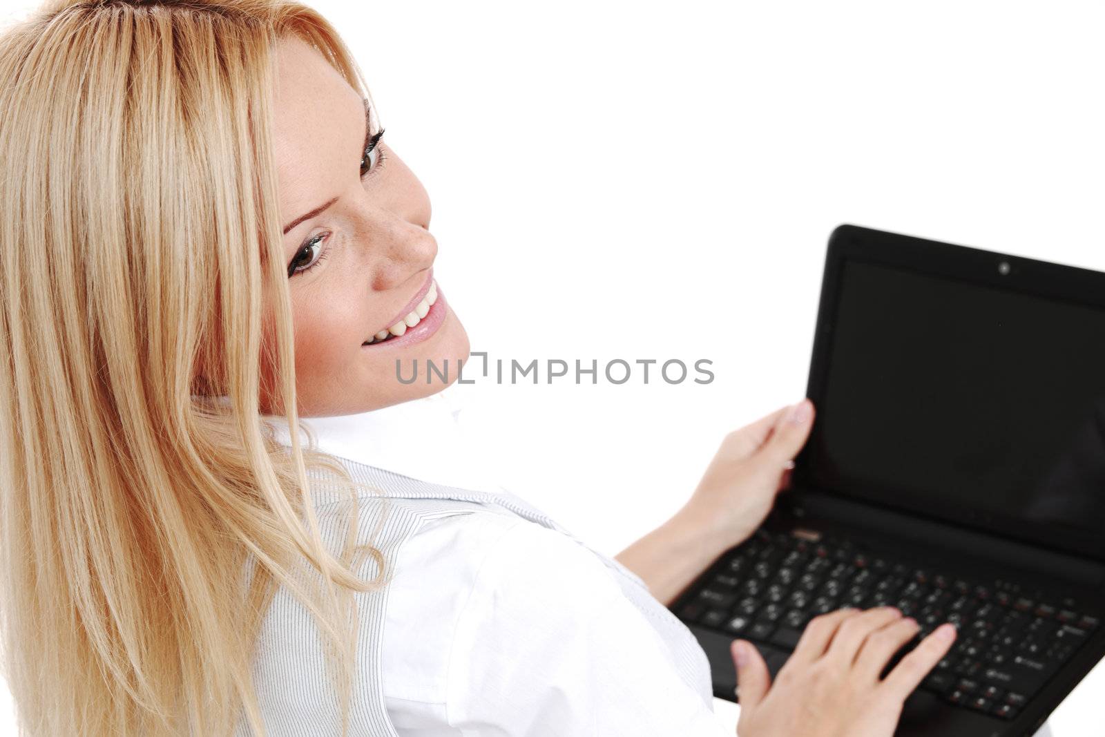 business woman lies and working on laptop