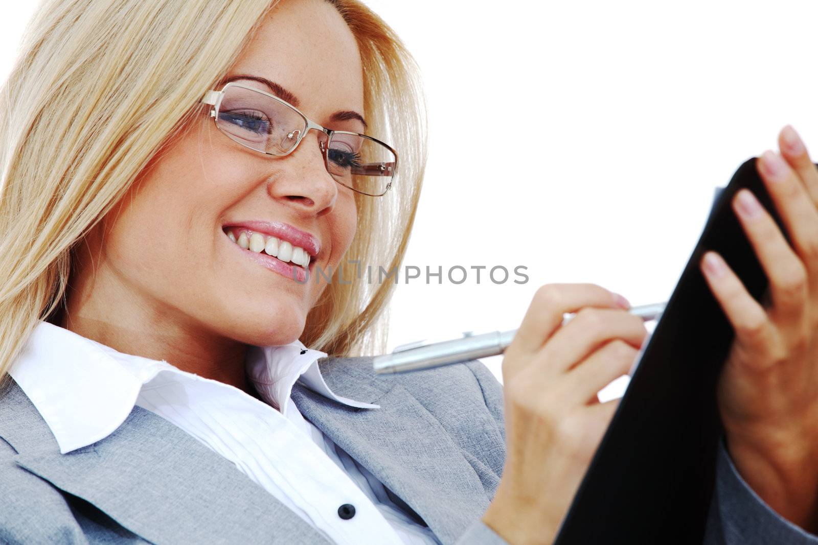 business woman hold a folder of papers  and write