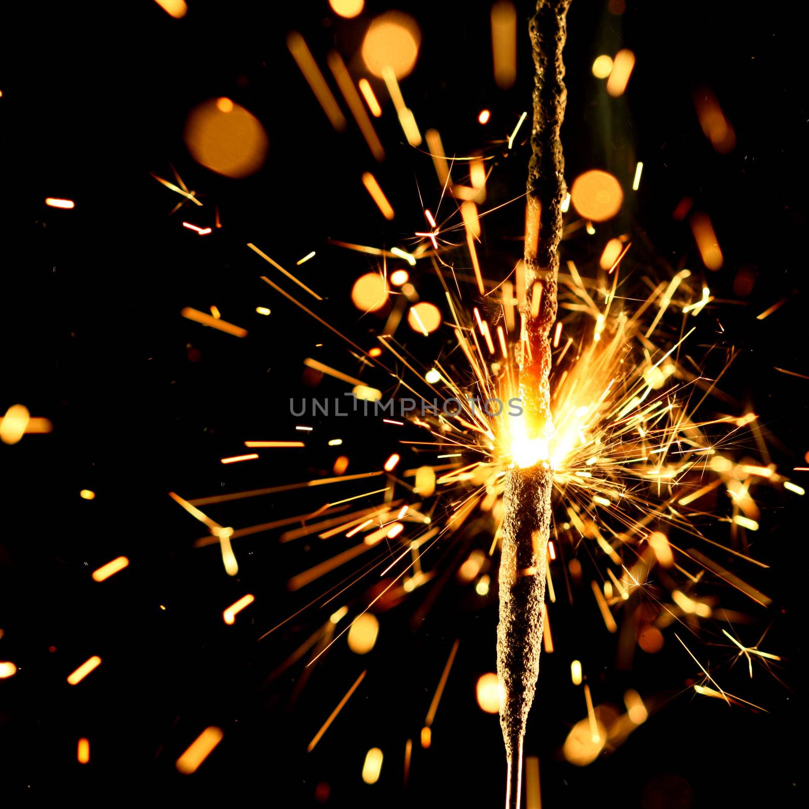 christmas sparkler firework flame on black