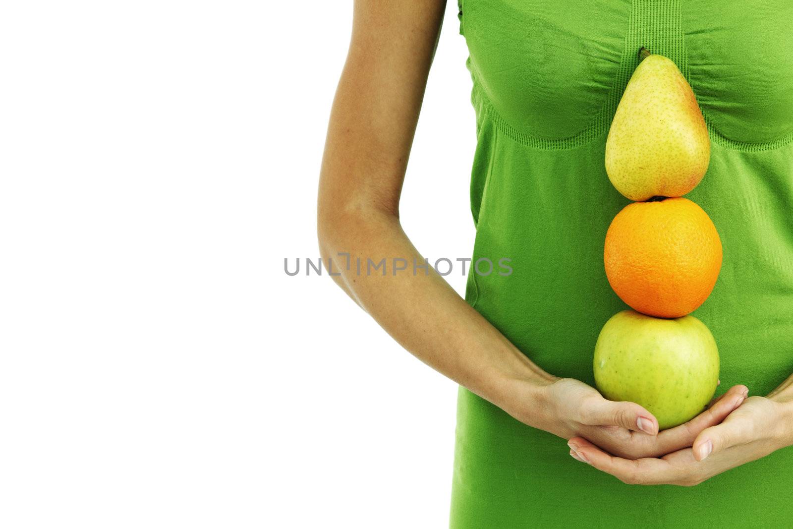 fruit pile in woman hands on white