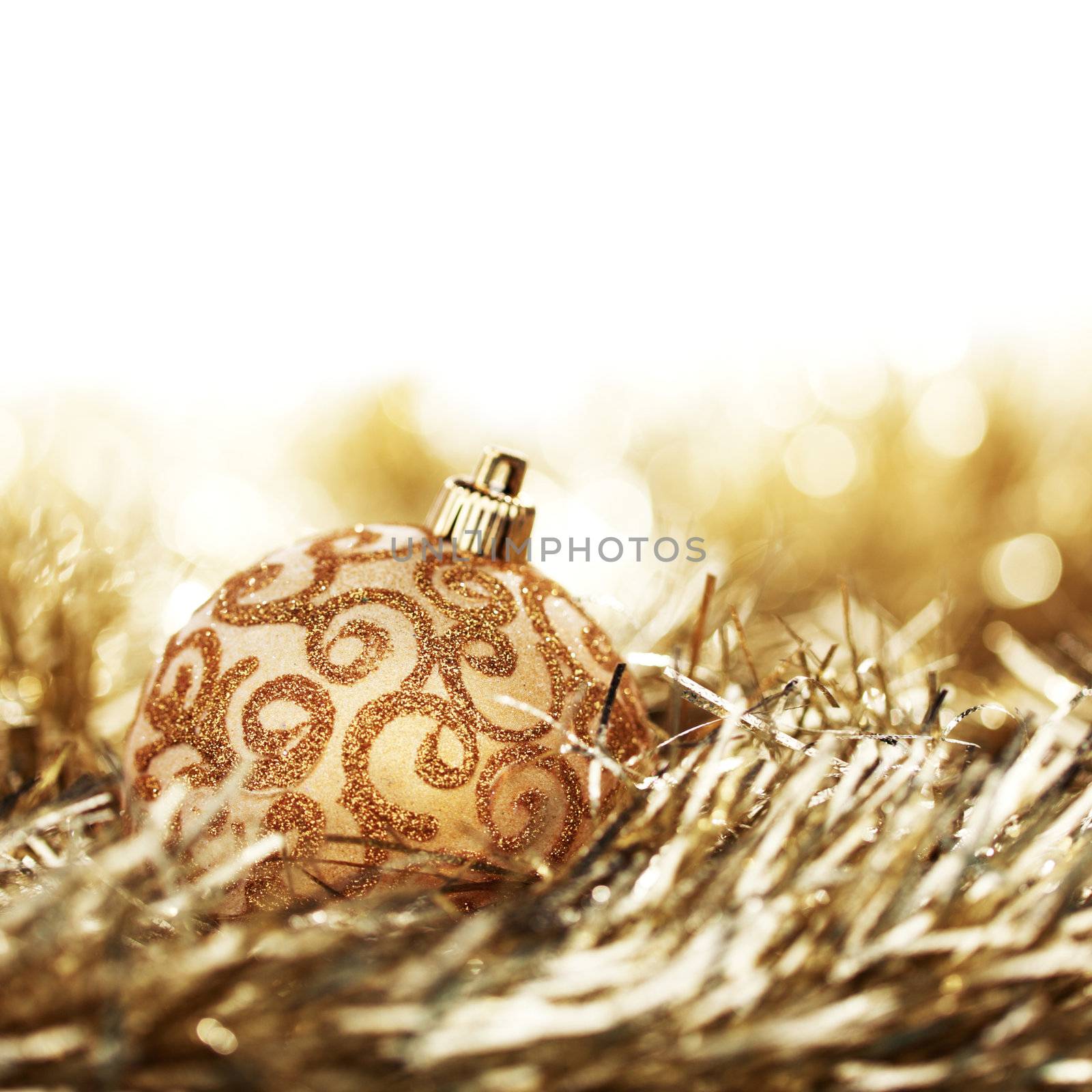 golden christmas ball on christmas background