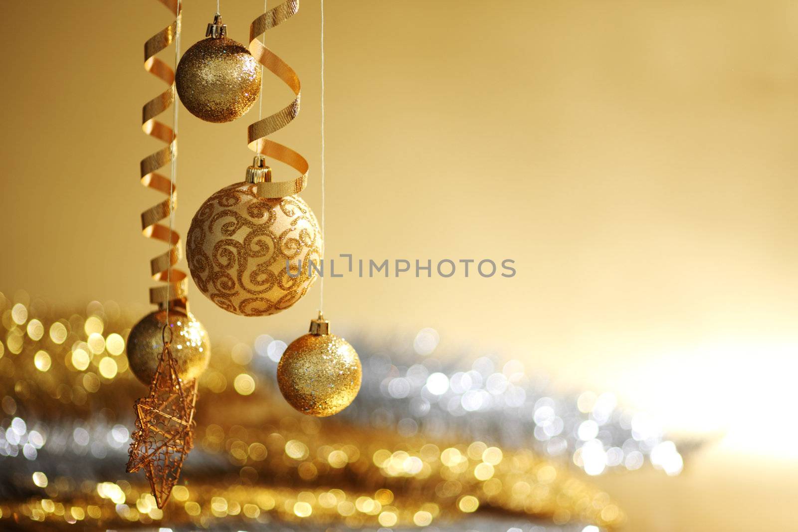 golden christmas balls on bokeh background