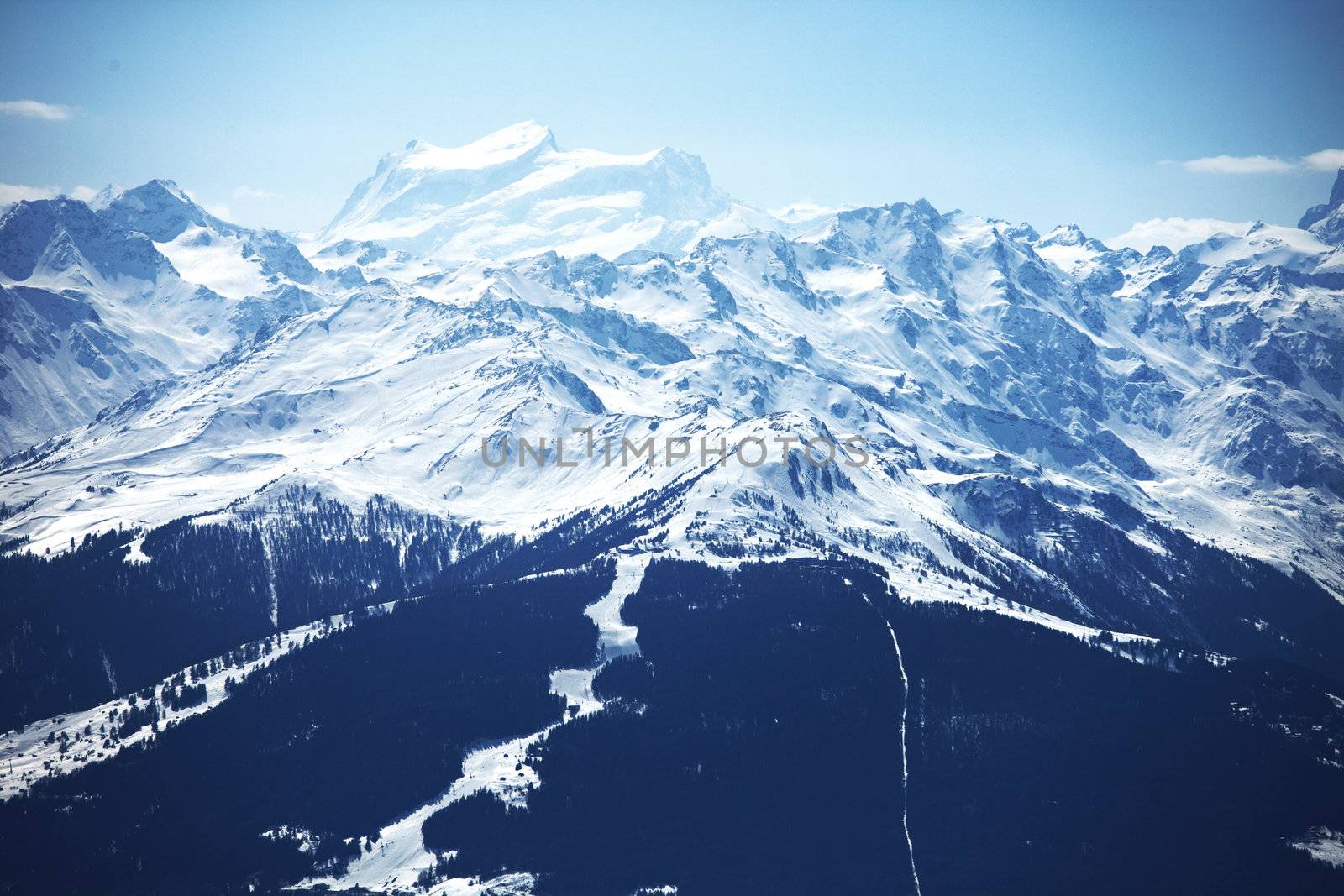 Top of the mountains in blue sky