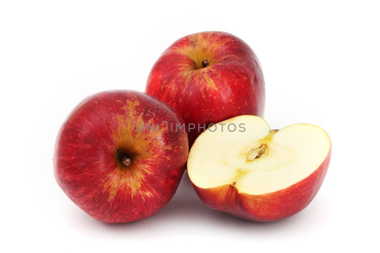 red apples pile slice isolated on white