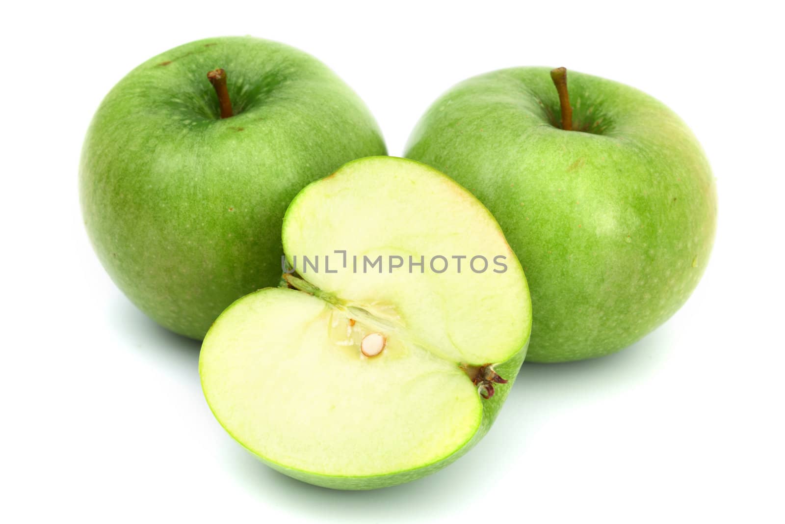 green apples pile slice isolated on white