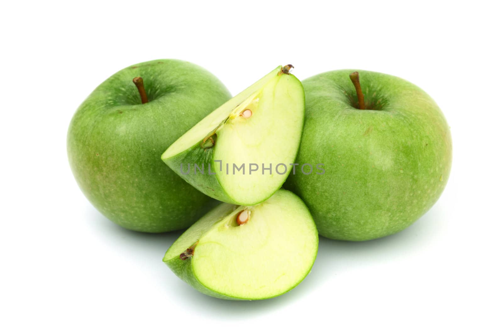 green apples pile slice isolated on white