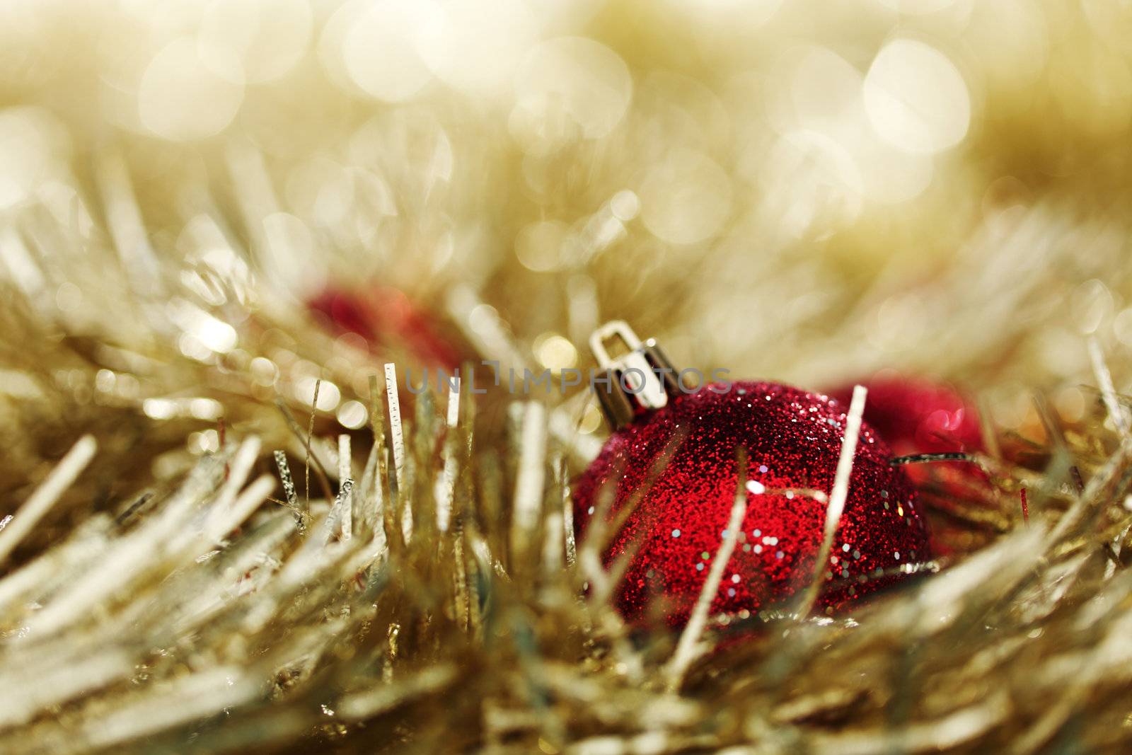 red christmas ball on holiday background