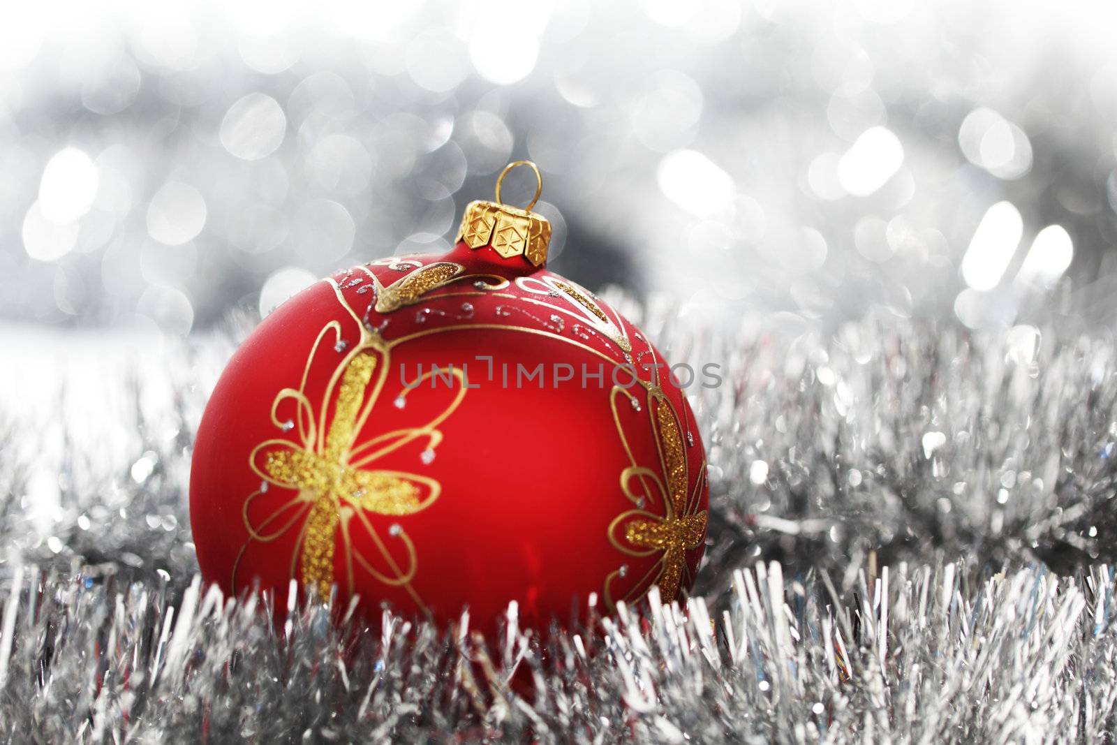 red christmas ball on holiday background