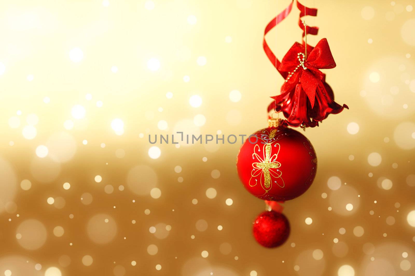  red christmas balls on gold  background