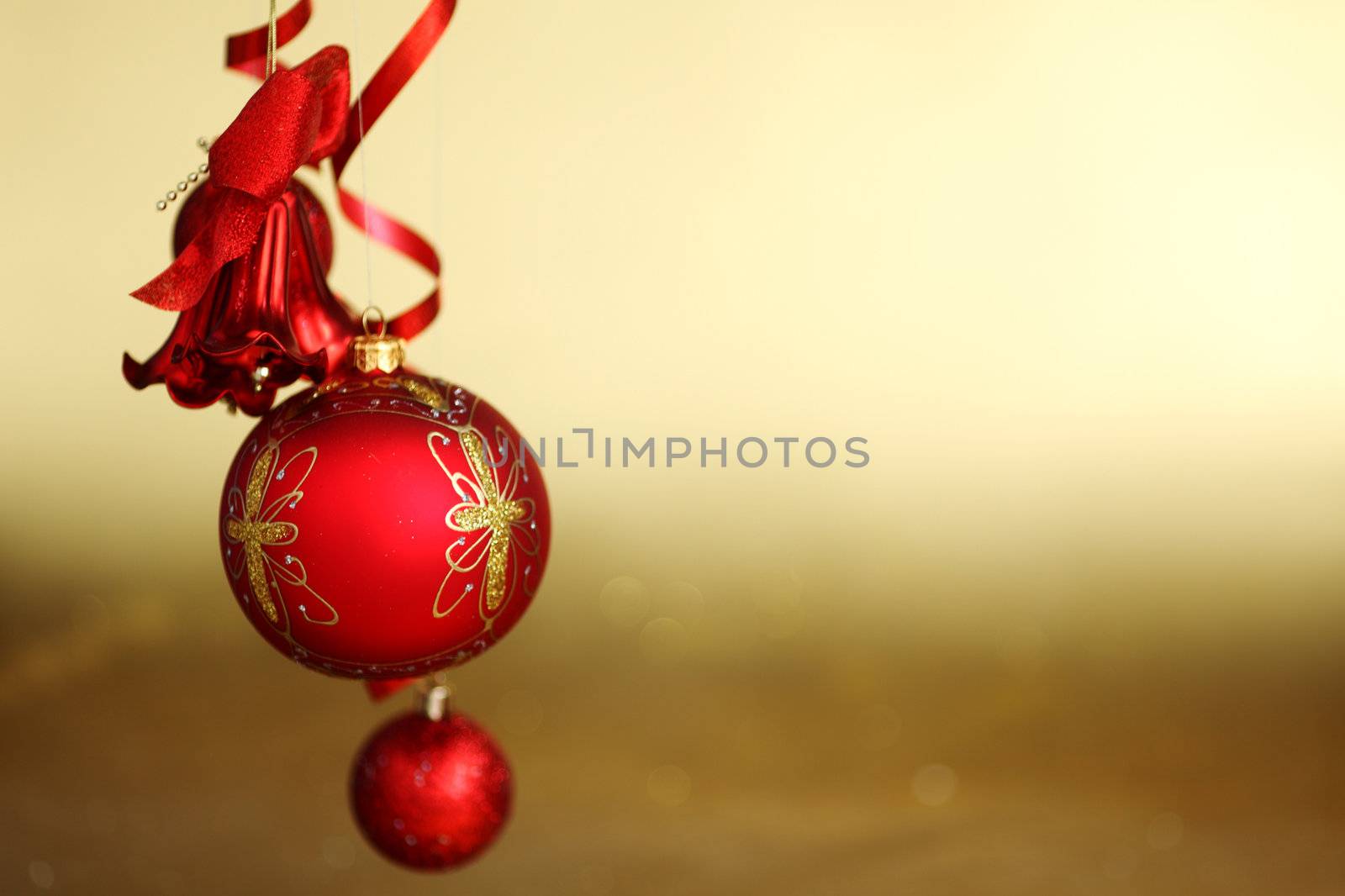  red christmas balls on gold  background