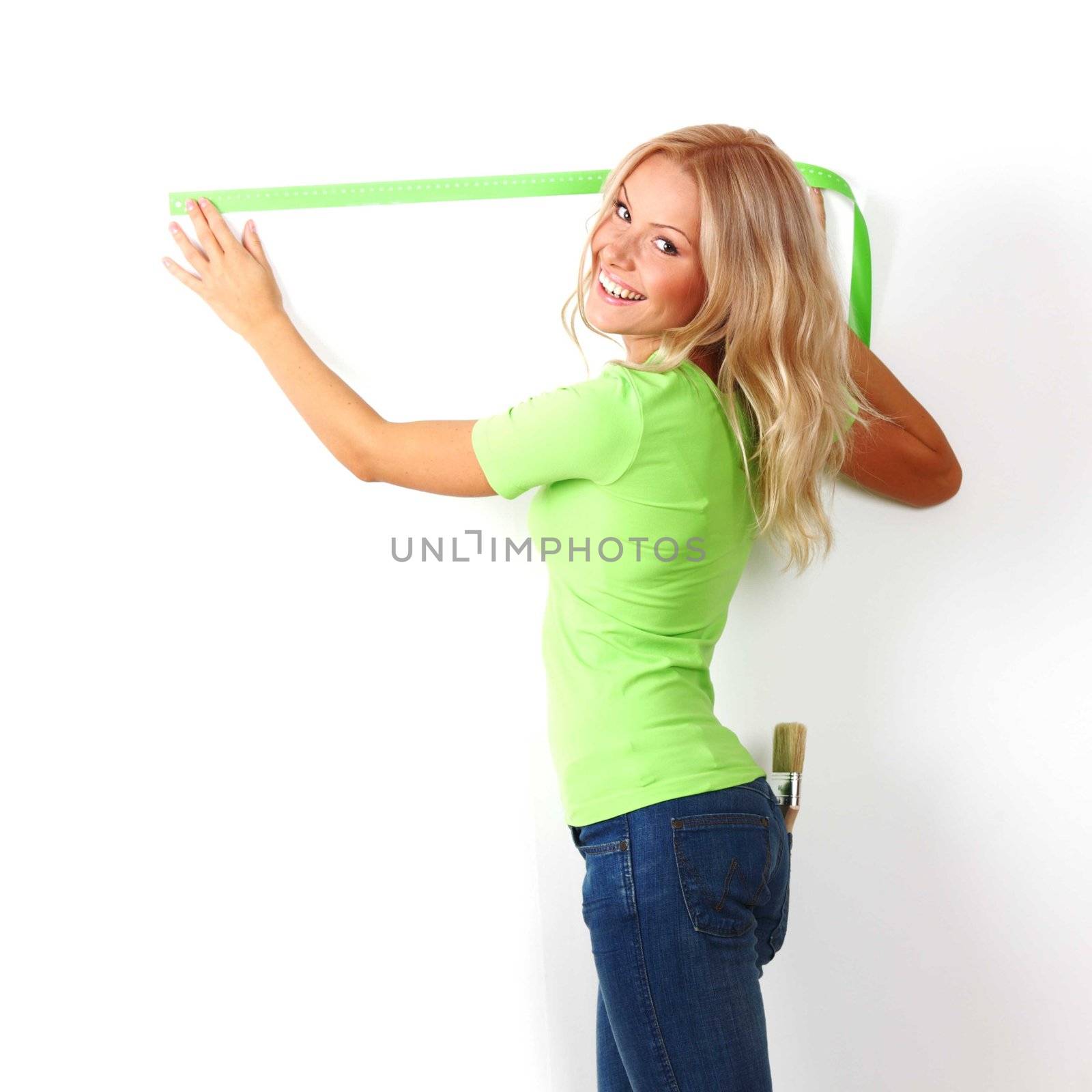 women often with a measuring tape to the wall