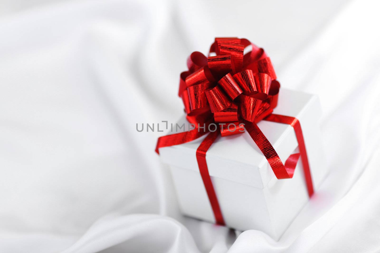  christmas gift on white silk background