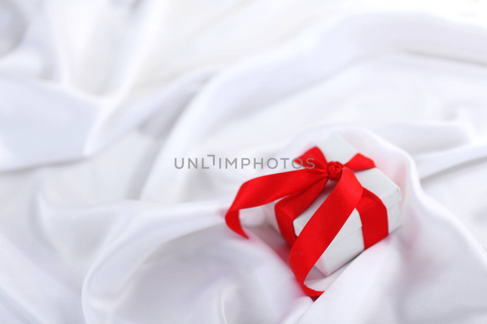  christmas gift on white silk background