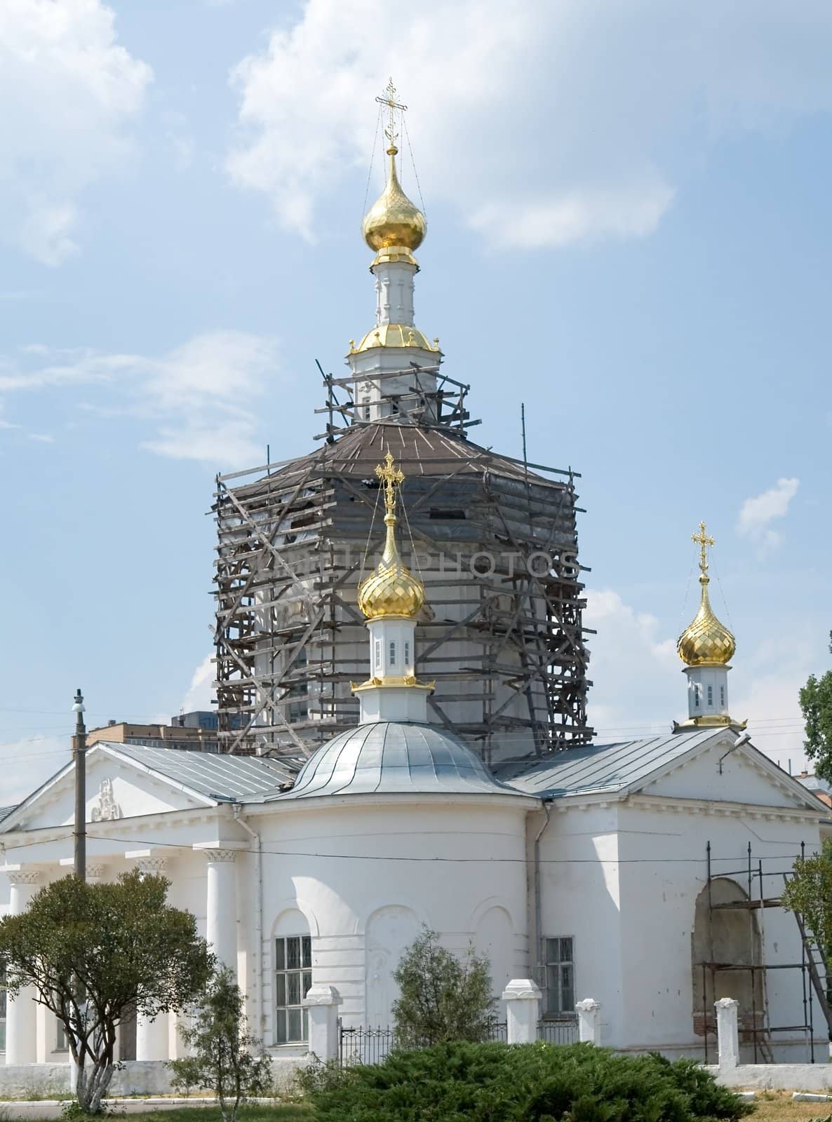 A under construction orthodox church with blue sky at background