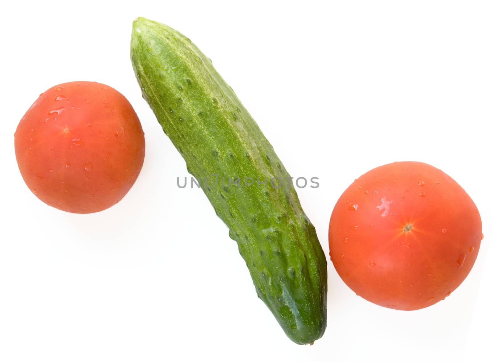 percent sign. fresh cucumber and tomatoes on a white background