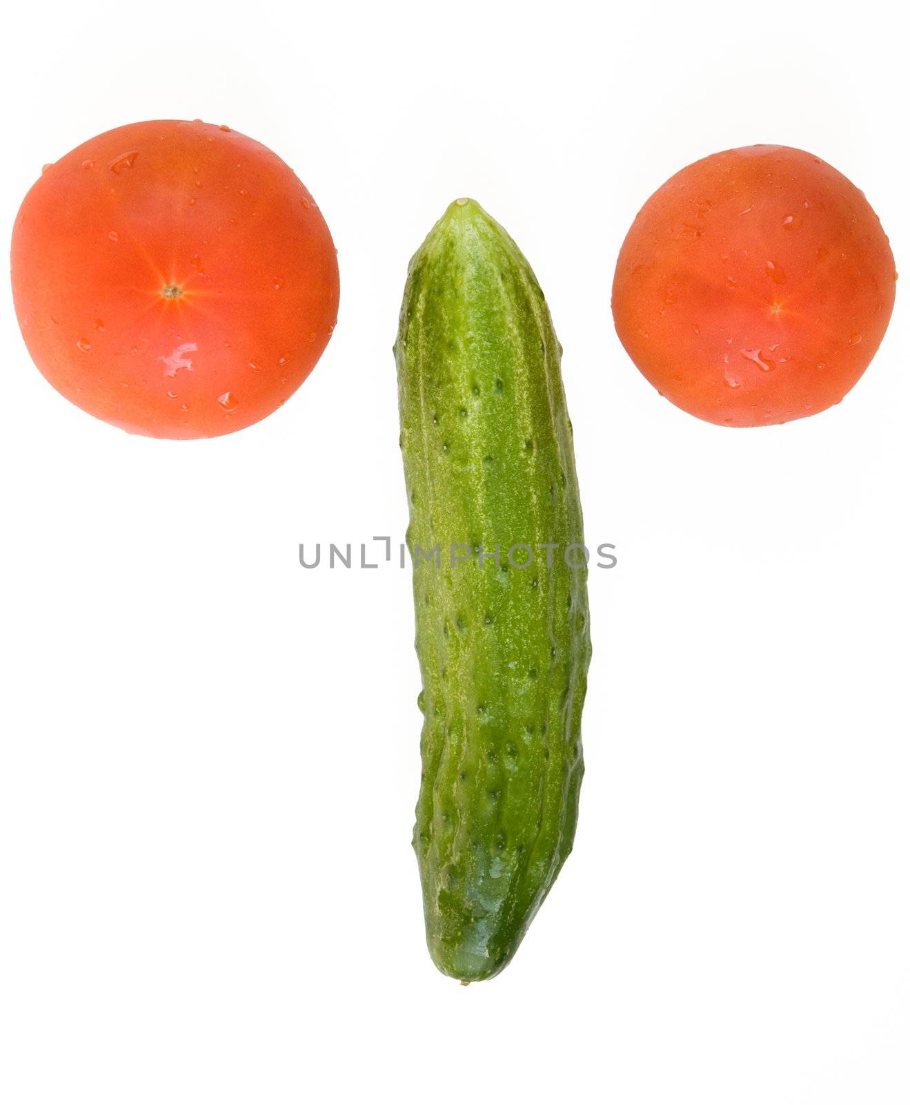 Abstract face. Green nose. Red eyes. fresh cucumber and tomatoes on a white background
