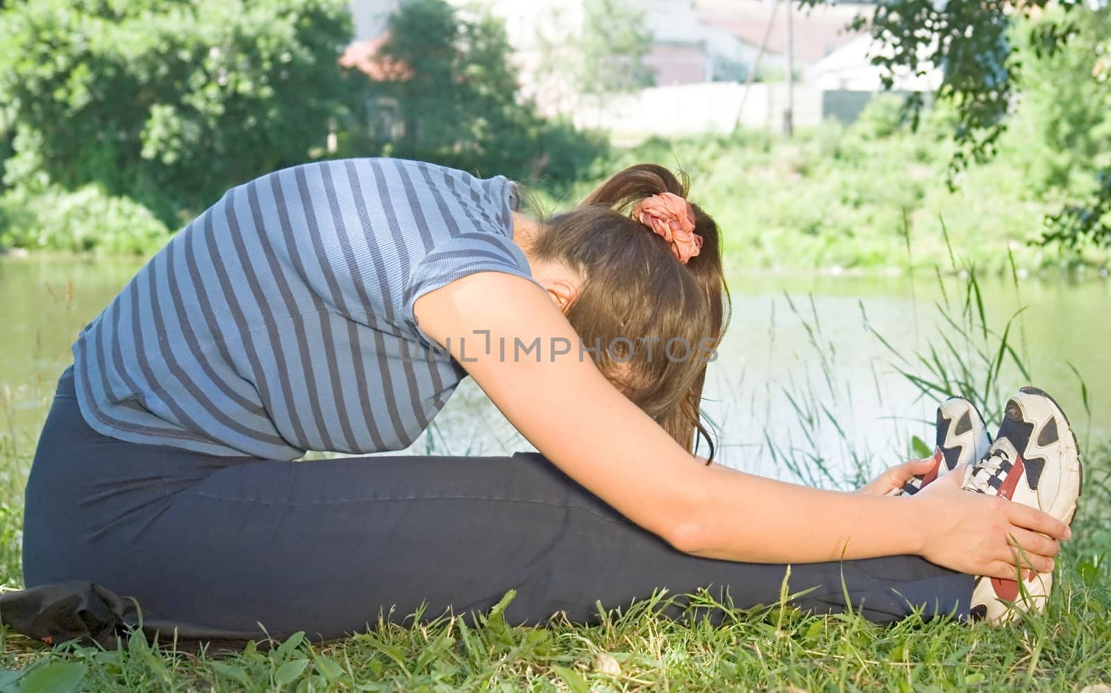Woman is trained on a riverside