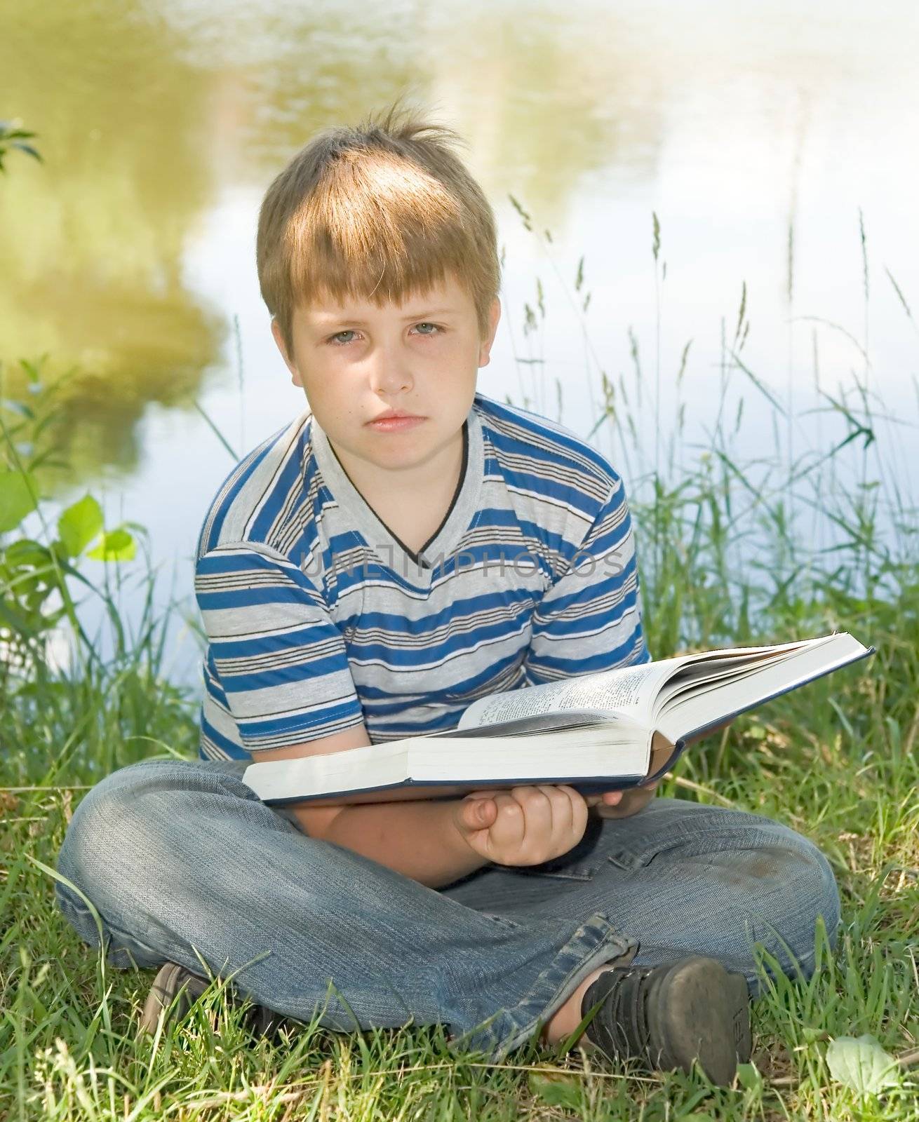 boy reads book by stepanov