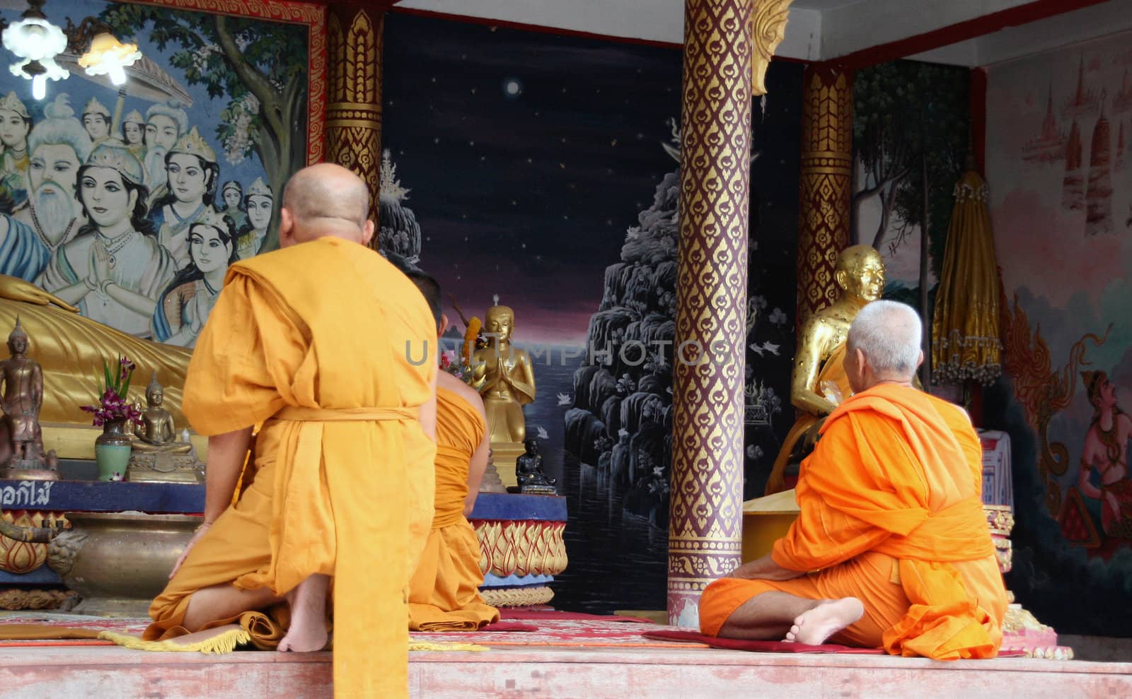 buddhist monks pray to buddha at big buddha temple samui island thailand