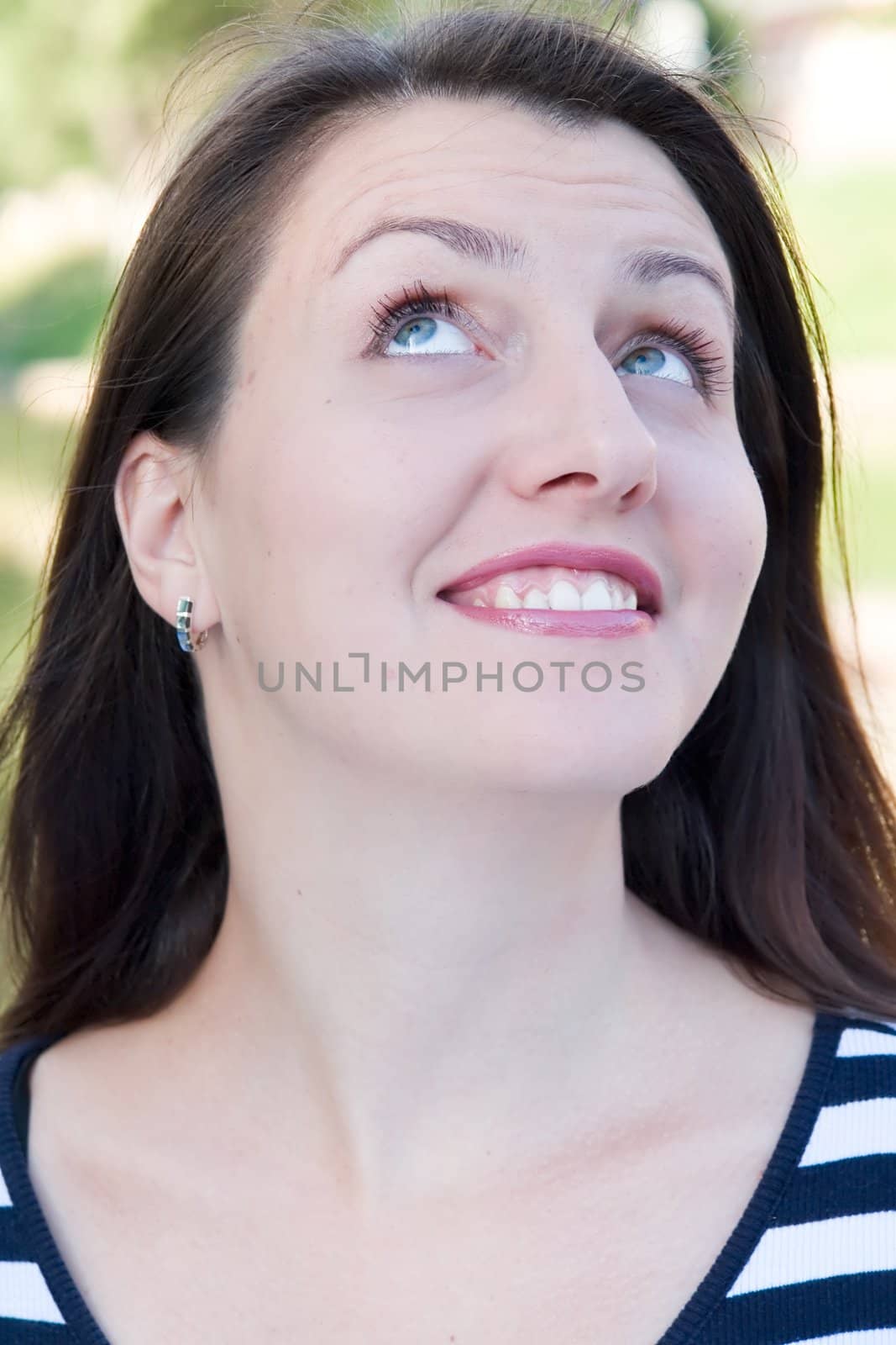 portrait. smile. young woman look up
