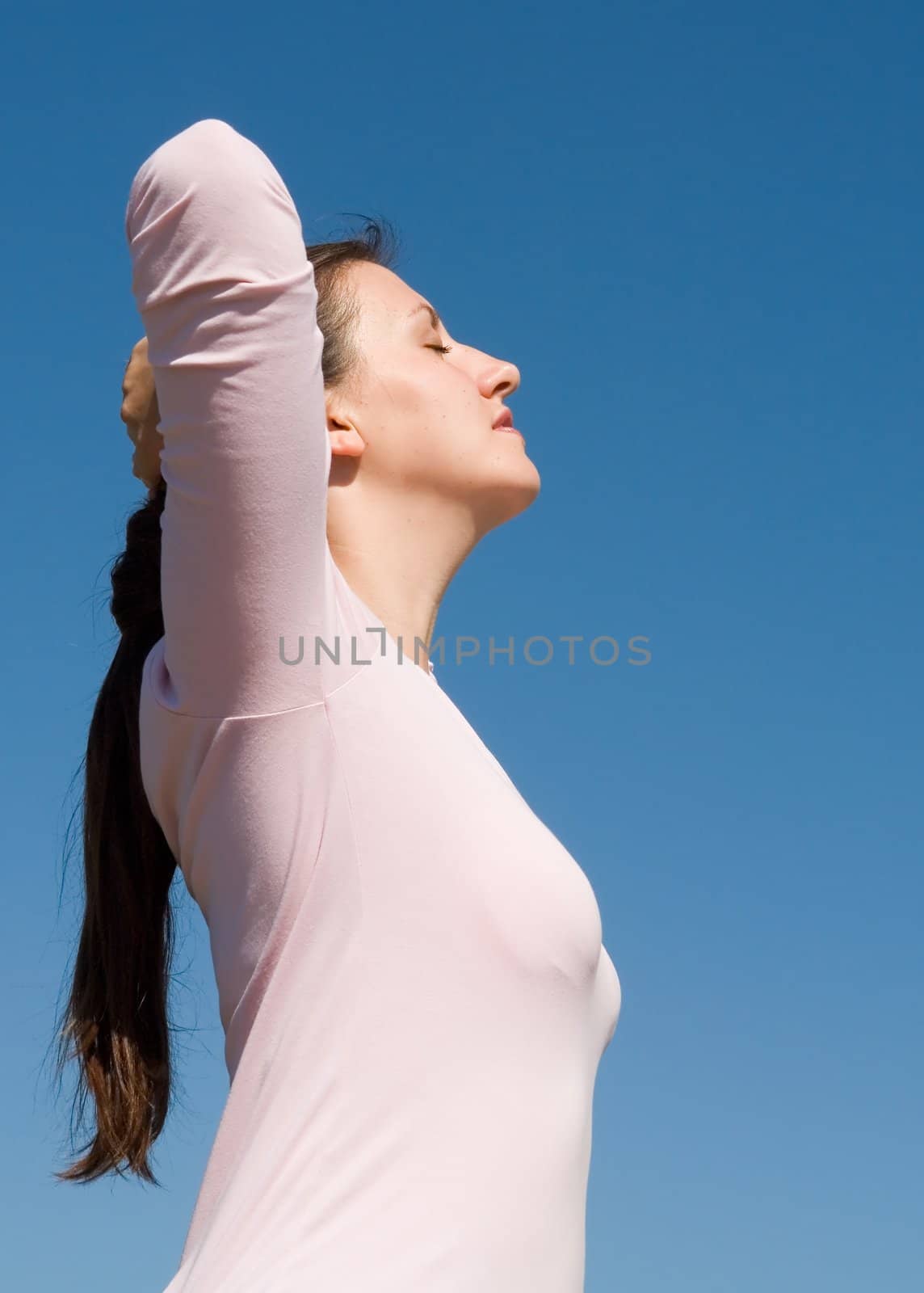 beautiful woman with sky at background