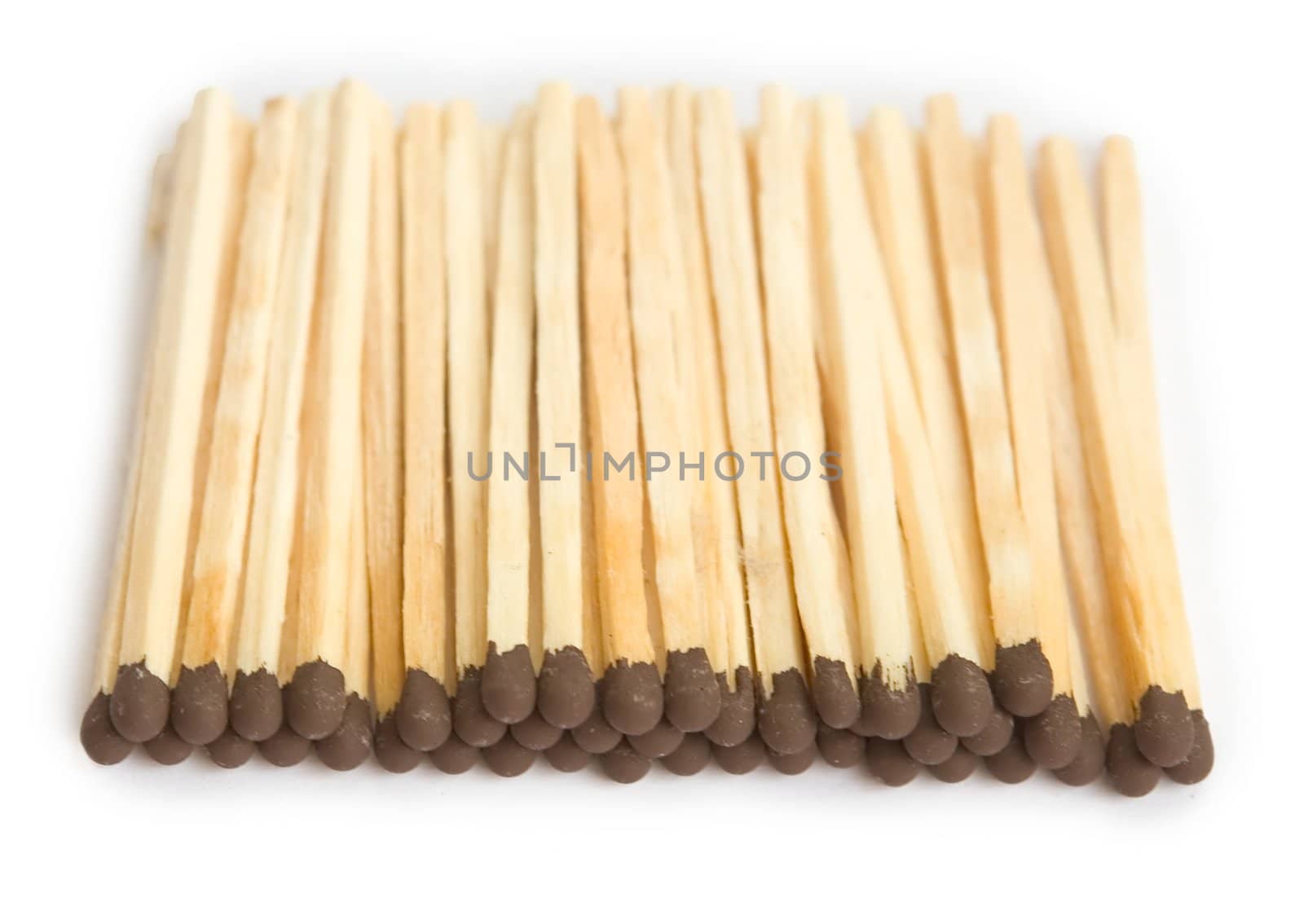 Heap of matches on a white background