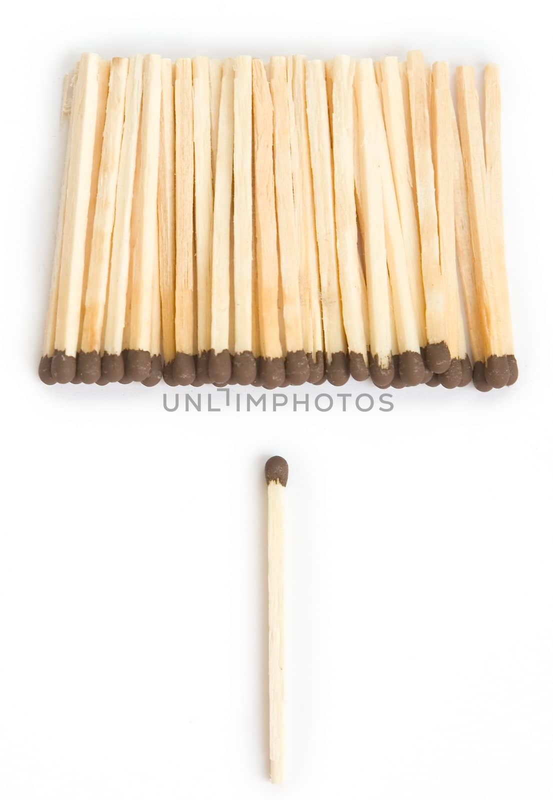 Nonconformism. One against all. A heap of matches on a white background