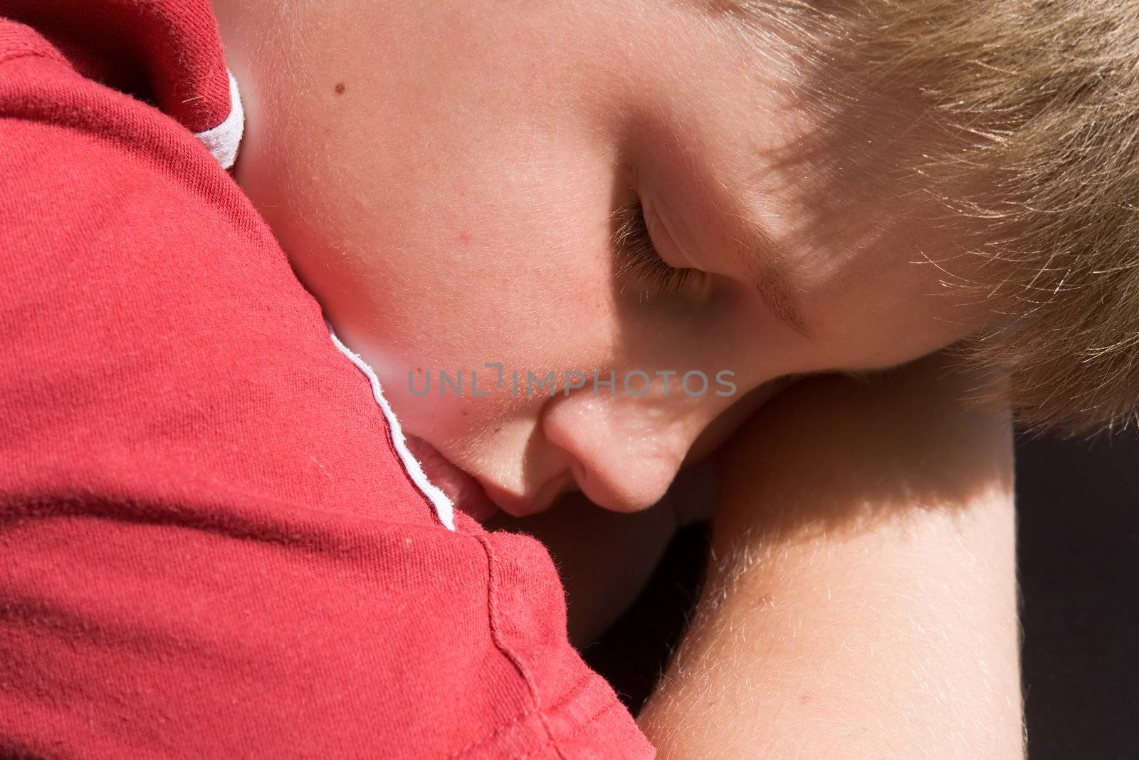 The little boy sleeps. A close up.