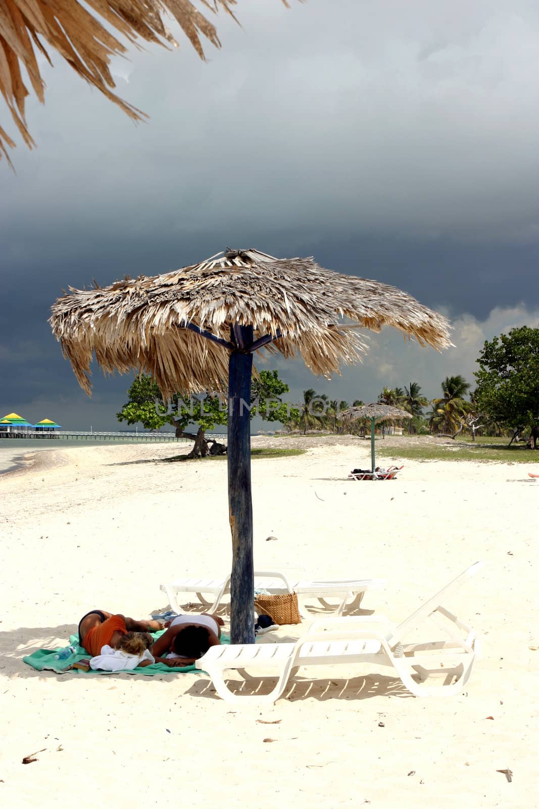 Sleepers and the beach of santa lucia in Cuba