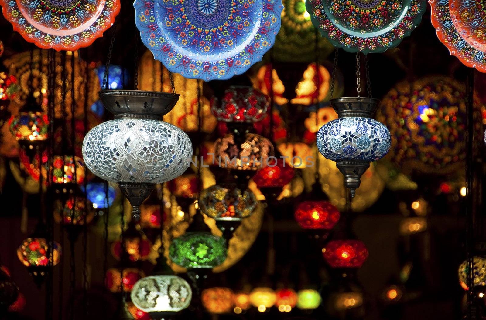 Colorful Arabic lantern and plates in a souk