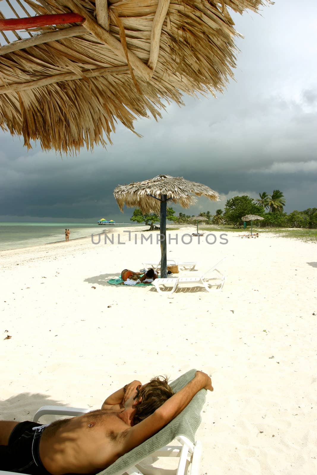 Sleepers and the beach of santa lucia in Cuba