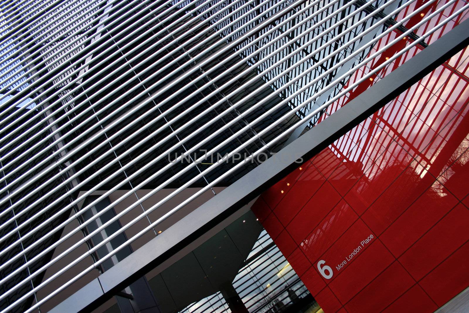 Red and low angle entrance of entrance to a corporate building in London