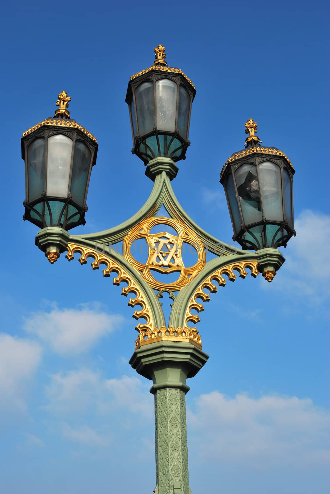 group of three street lights