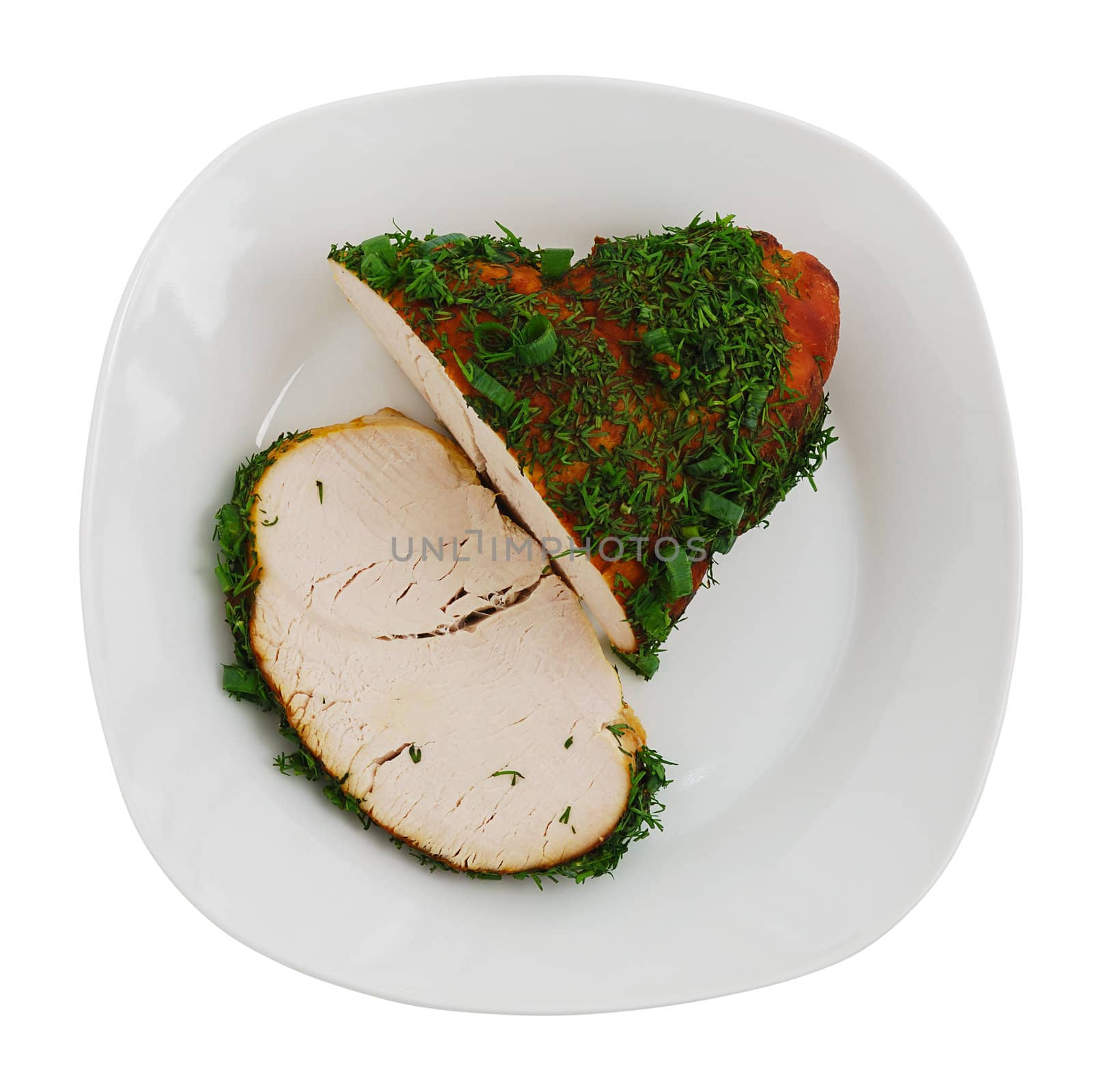 Sliced roasted turkey breast on plate by vadidak