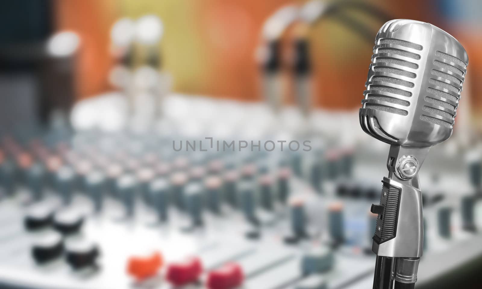 Retro microphone with mixer background by Suriyaphoto