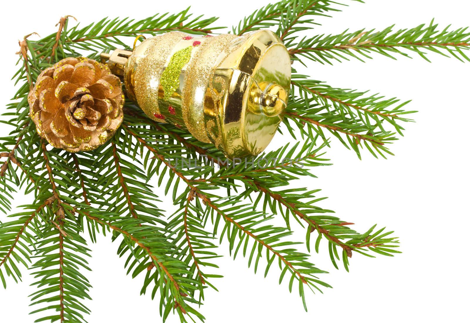cone and bell on fir tree branches, isolated on white