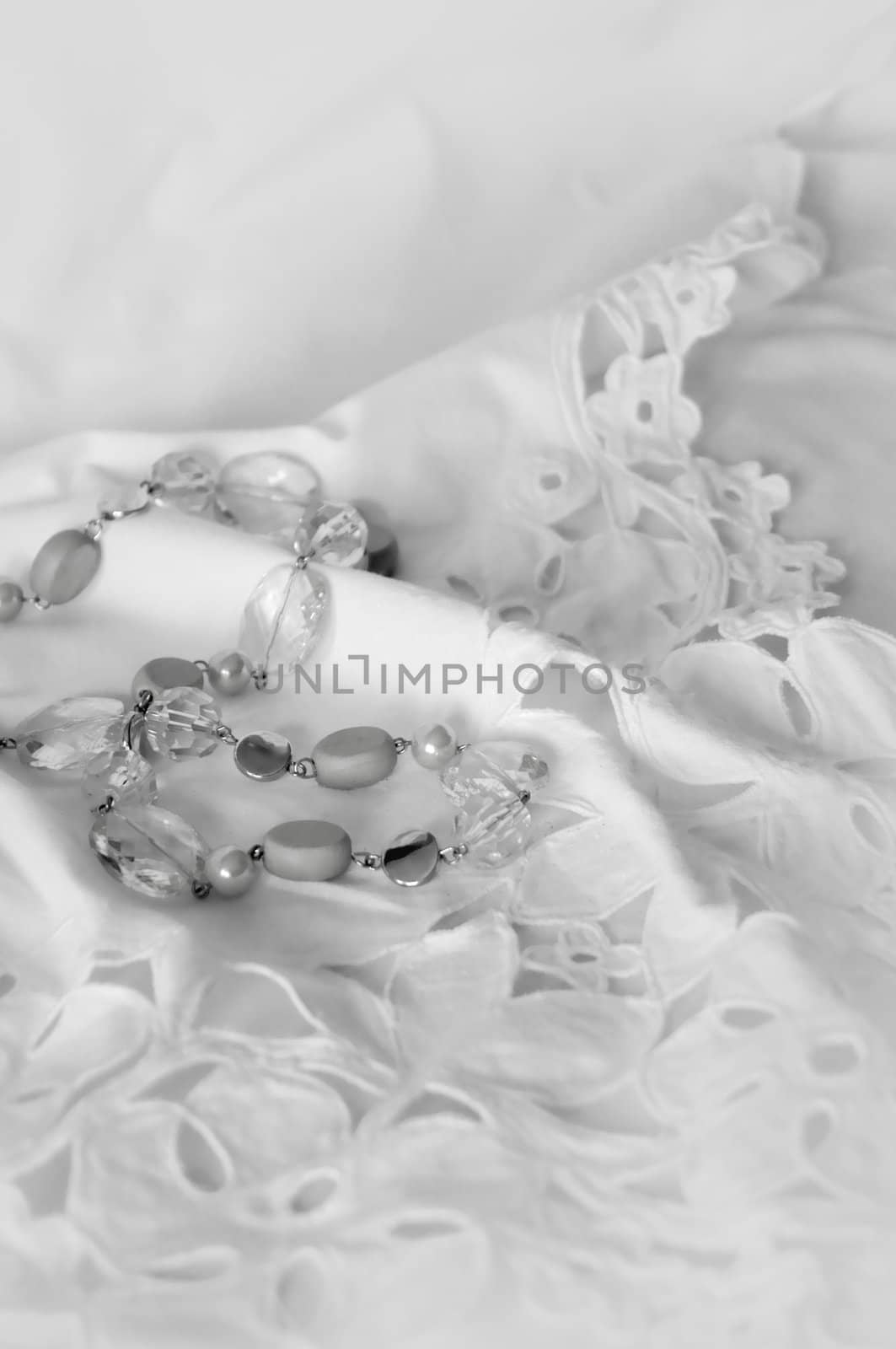 White lace with floral pattern on background                  