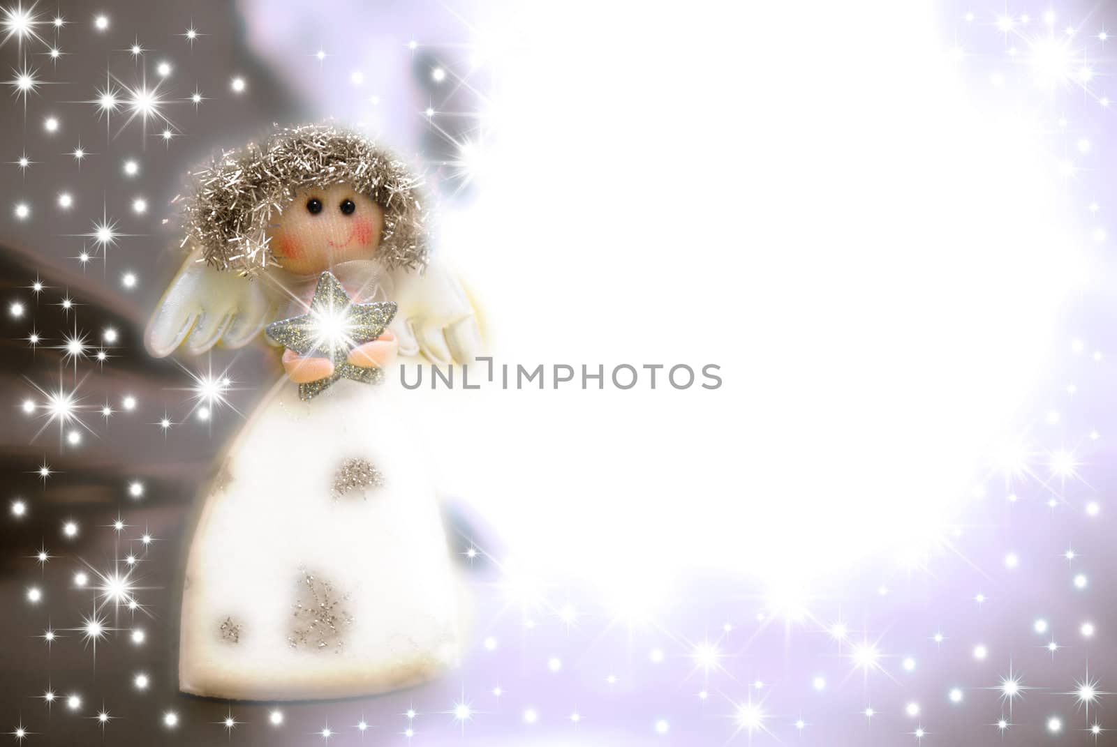 Christmas angel starry background with copy space