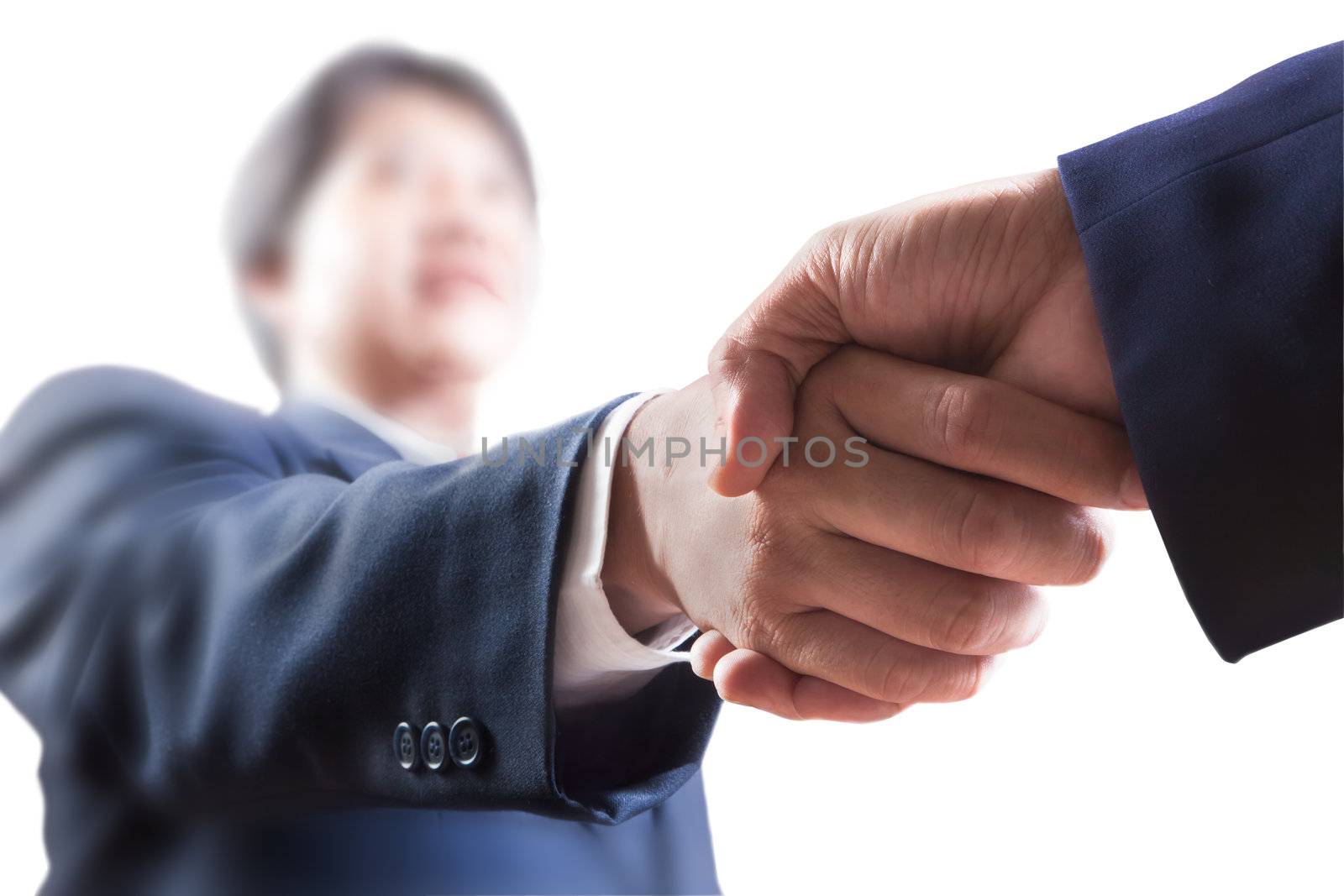 Closeup of business people shaking hands