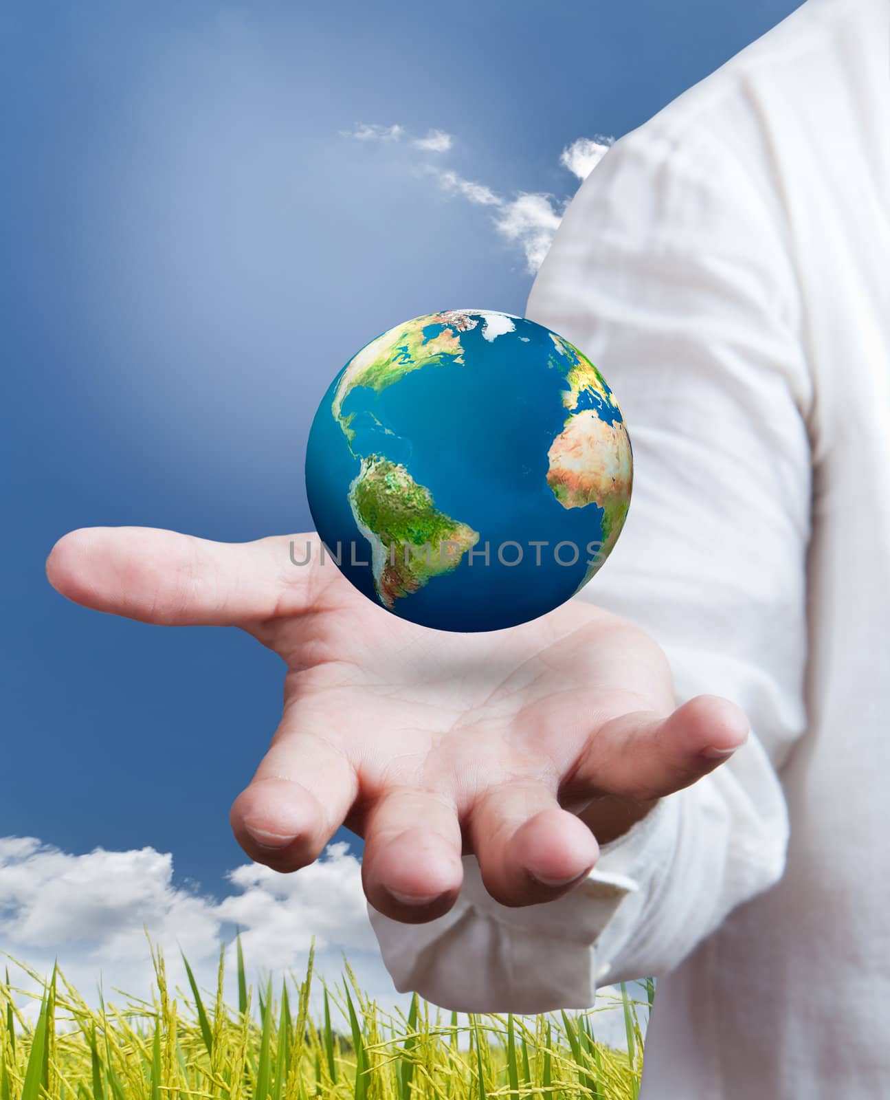 earth globe in his hands, saving environment concept by Suriyaphoto