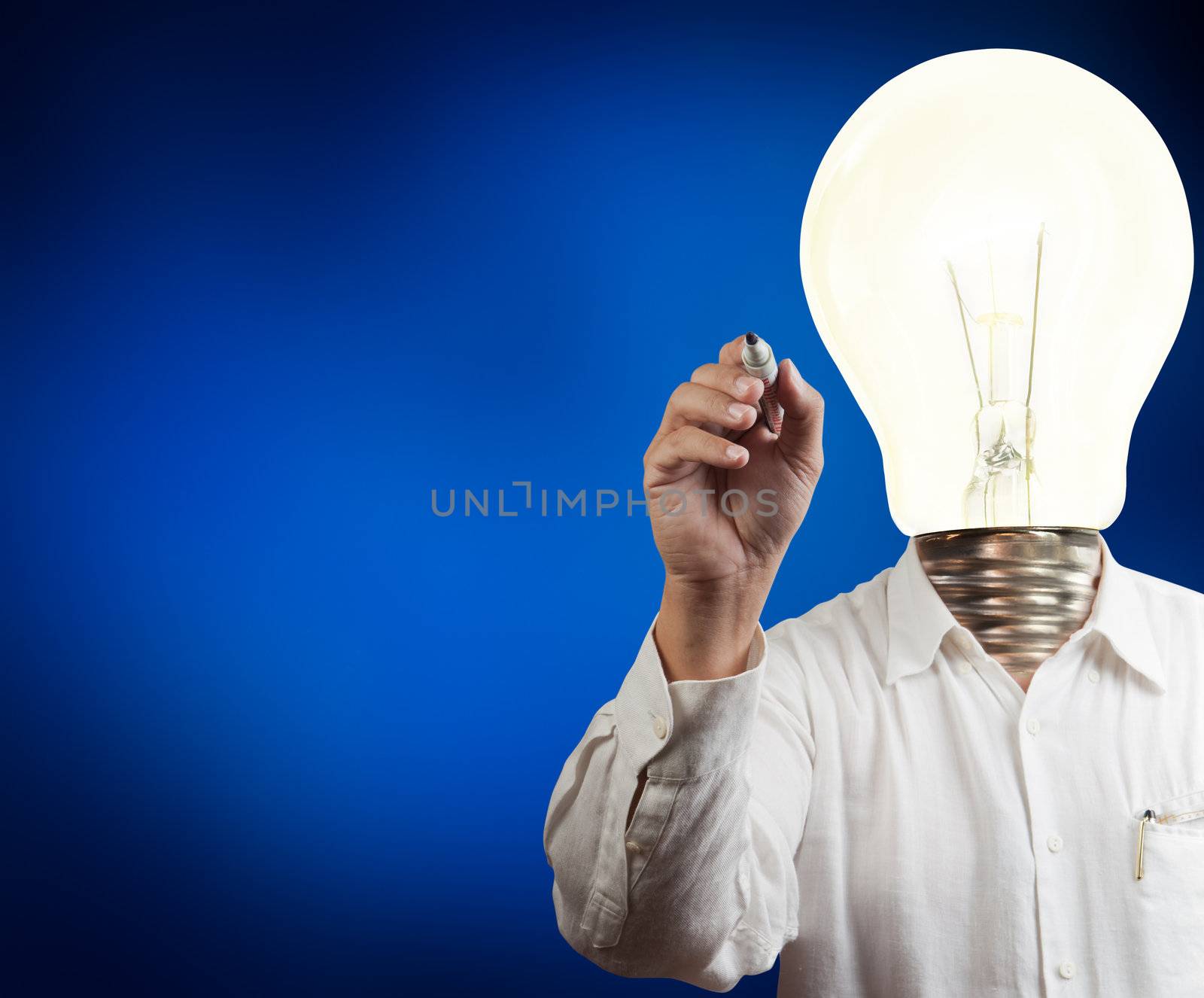 businessman with lamp-head drawing on white board