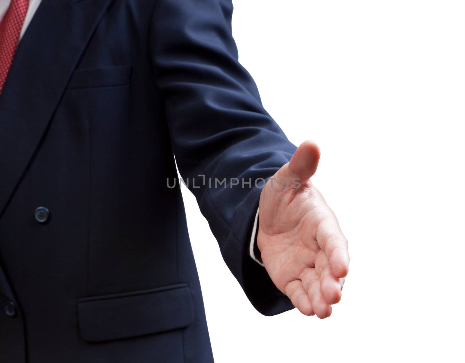 A business man with an open hand ready to seal a deal by Suriyaphoto