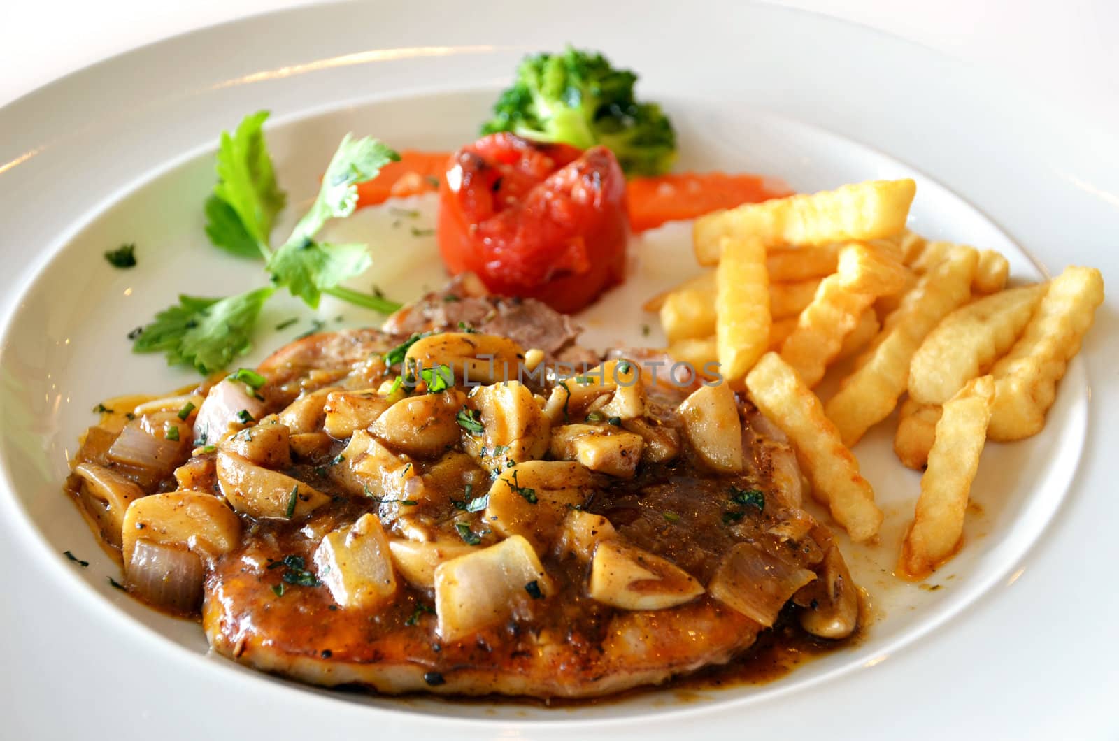 Delicious beef steak with mushrooms 