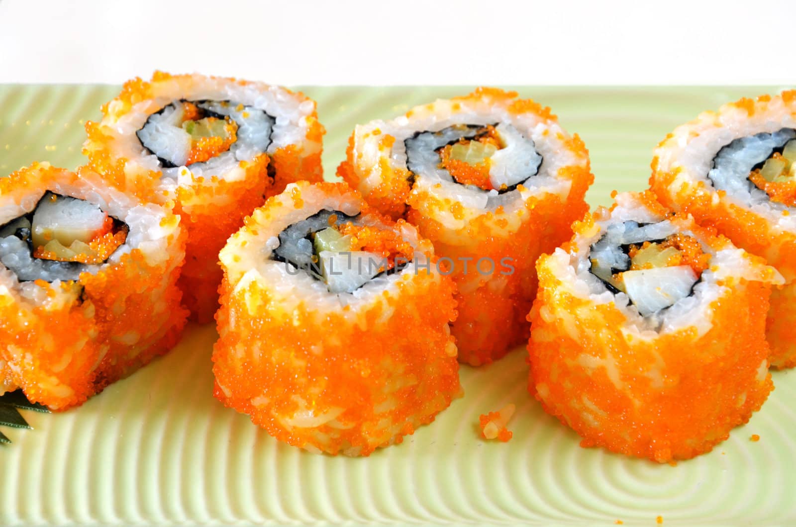 egg imitation crabmeat cucumber tuna and salmon roll sushi