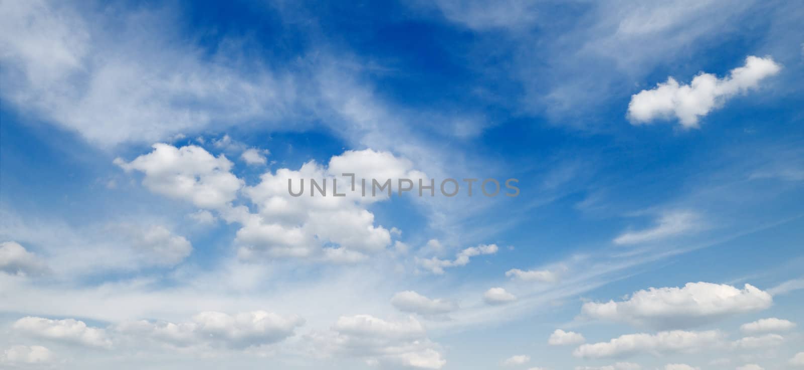 clouds on a background of the blue sky