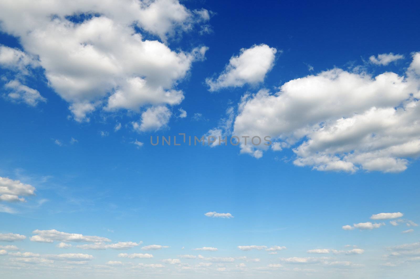 clouds on a background of the blue sky